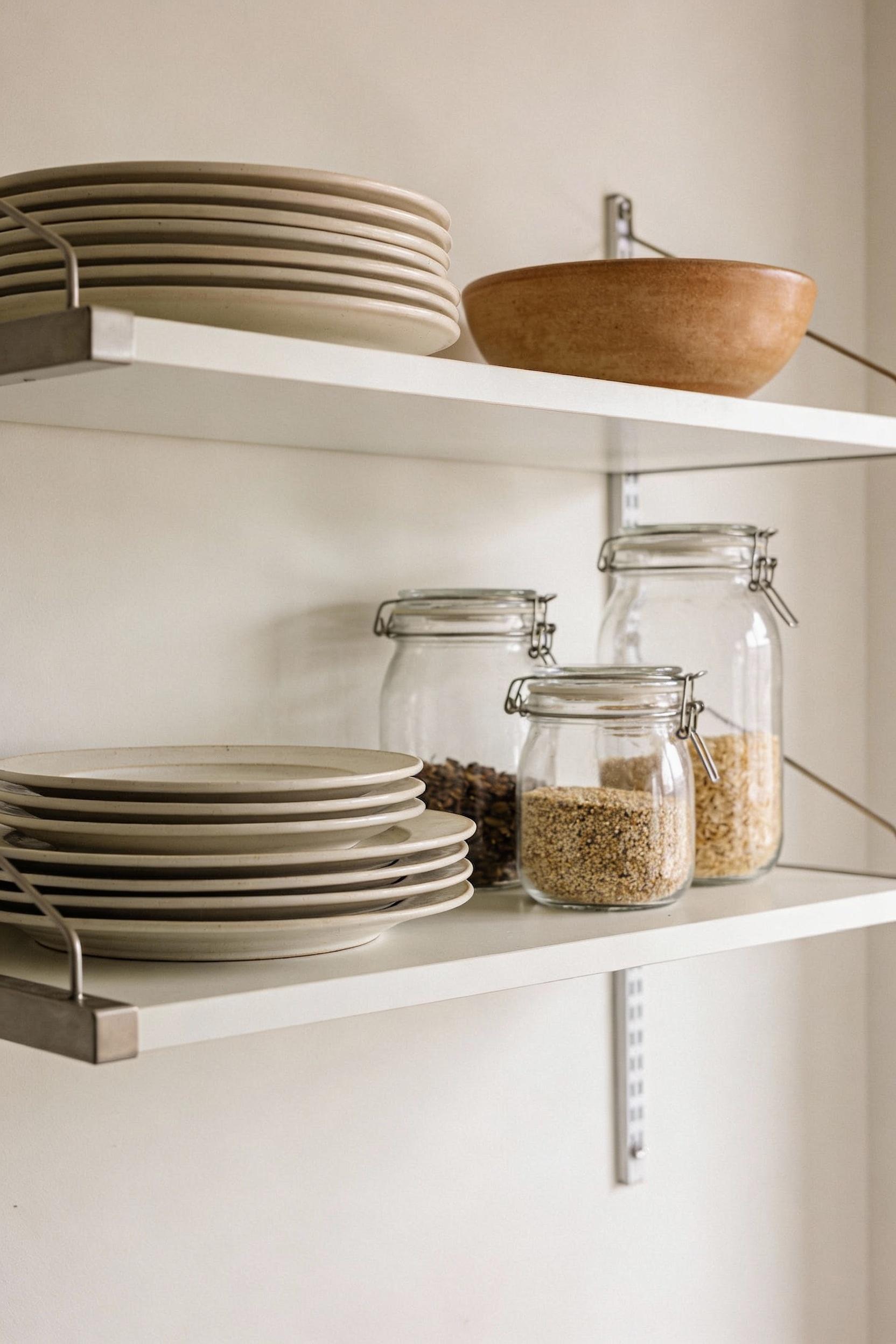 Add open shelving, but keep it calm and curated